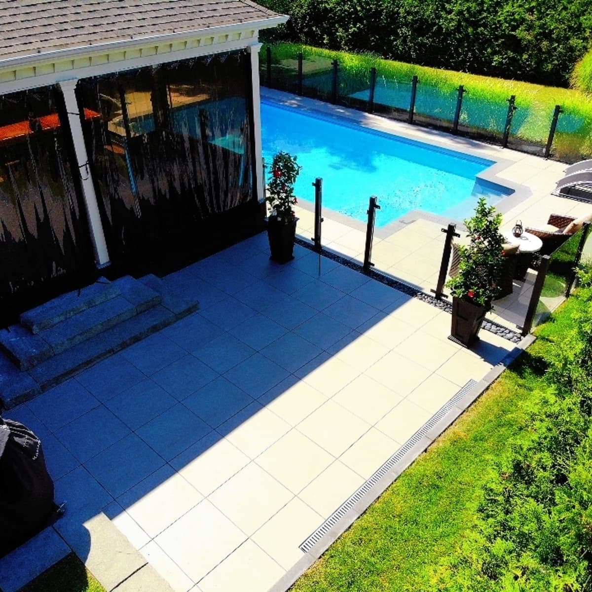 Porcelain patio around a residential pool